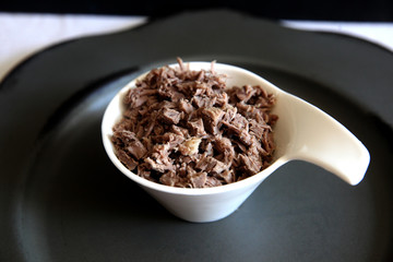 Boiled chopped meat  on white plate