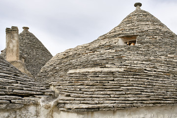Fototapeta na wymiar Old trulli houses in Alberobello town in Italy