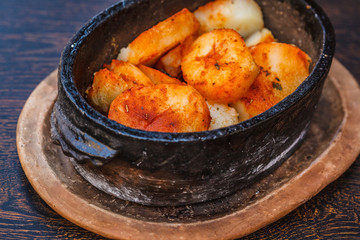 National Balkan food baked potato on the table in the restaurant.