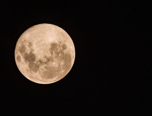 full moon over black