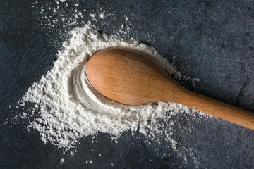 Baking Powder Spilled from a Teaspoon