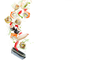 Seamless pattern with sushi. Food abstract background. Flying sushi, sashimi and rolls isolated on the white background.