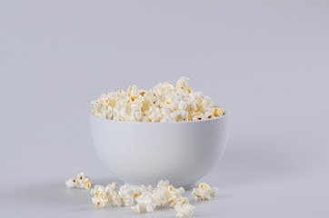 Buttery popcorn in white ceramic bowl