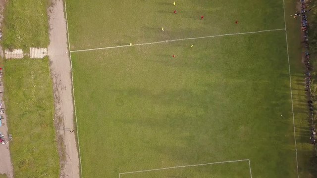 Aerial Photography football match. Amateur football players play football. 4k
