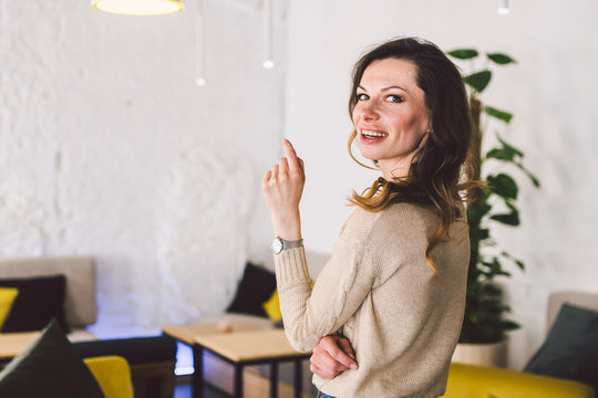 Good Looking Mid Aged Woman Portrait At Home. Elegant Business Woman. Middle-Aged Woman Standing In Modern Home