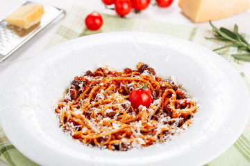 Traditional Italian Pasta Spaghetti Tomato Sauce. Delicious Mediterranean Meal Dinner Plate Restaurant Menu Table Background. Grated Cheese Healthy Food Nutritious Dish Closeup Flat Lay