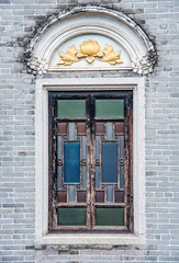 Colorful patterned glass windows of the ancient buildings of Zumiaoling, Foshan, Guangdong, China