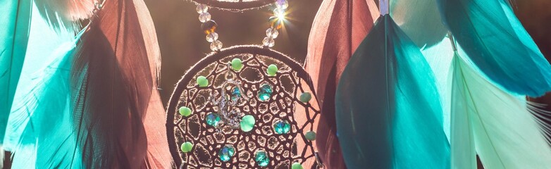 Banner of Handmade dream catcher with feathers threads and beads rope hanging