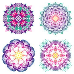 A set of four mandalas with a gradient fill