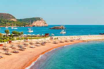 Picturesque summer view to the Adriatic sea coast with private beach of Sveti Stefan island in...