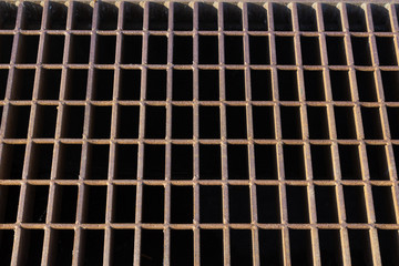 Rusted steel grid grate background pattern, horizontal aspect