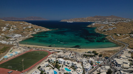 Aerial drone photo of paradise celebrity bay of Ornos famous for pool resorts and sandy turquoise...