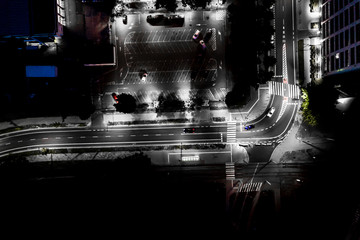 The light on the road at night and the city in Warsaw Road beautiful. Aerial view. Top view. Background scenic road. curves road drone