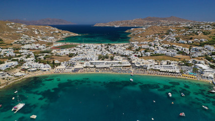 Aerial drone photo of paradise celebrity bay of Ornos famous for pool resorts and sandy turquoise...