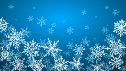 Christmas background with various complex big and small snowflakes in blue colors