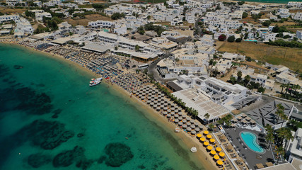 Aerial drone photo of paradise celebrity bay of Ornos famous for pool resorts and sandy turquoise...