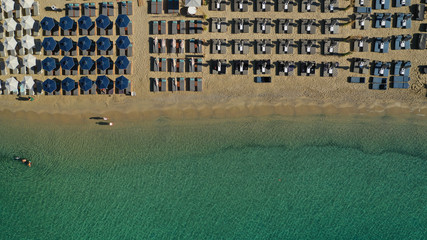 Aerial drone photo of paradise celebrity bay of Ornos famous for pool resorts and sandy turquoise...