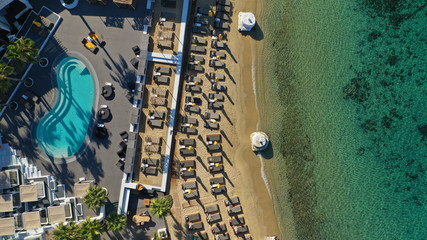 Aerial drone photo of paradise celebrity bay of Ornos famous for pool resorts and sandy turquoise...