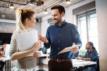 Portrait of architects having discussion in office