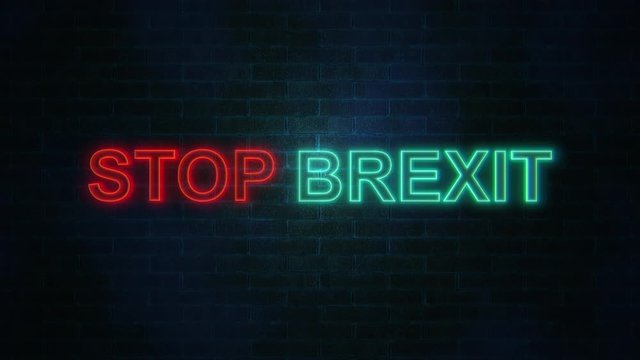 The word Stop Brexit with neon colours flickering on brick wall. Brexit concept, 4k