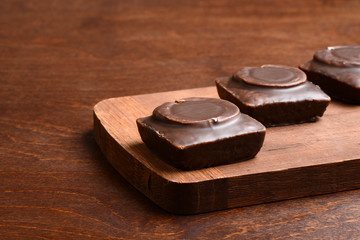 closeup small dark chocolate cakes