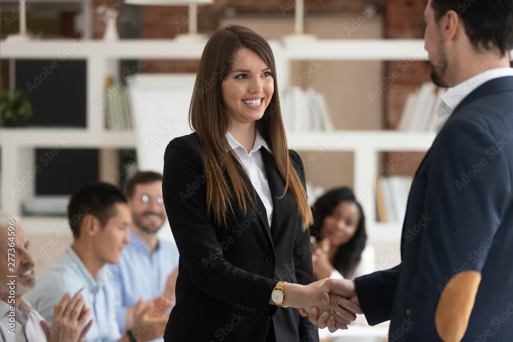 Sticker Happy female worker get rewarded for good work handshake boss