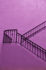 purple wall black railing abstract