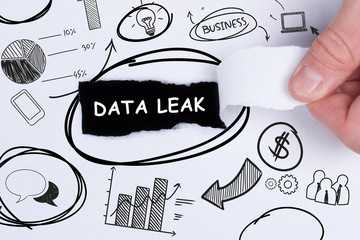 Business, technology, internet and networking concept. Young entrepreneur showing keyword: Data leak
