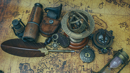 Fototapeta na wymiar Penquill And Vintage Collection On World Map
