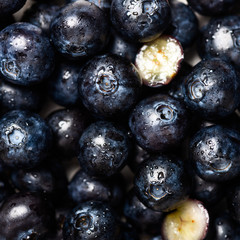Close up of fresh summer berries such as blueberries, macro background image, top view
