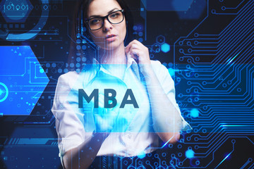 The concept of business, technology, the Internet and the network. A young entrepreneur working on a virtual screen of the future and sees the inscription: MBA