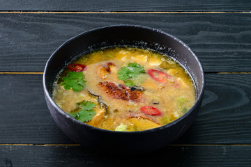 Tom yam kong or Tom yum, Tom yam is a spicy clear soup typical in Thailand. Thai food.