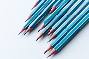 Composition of pencils on white background