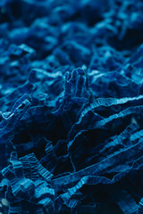 Macro photo of blue paper decor material