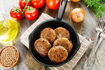 Buckwheat  burgers on the pan
