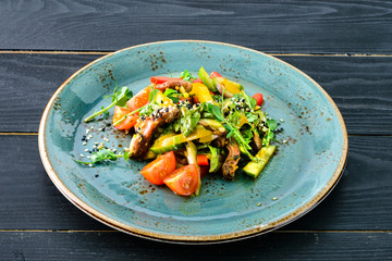 Asian food. Soba noodles with beef, shrimps and vegetables . Top view.