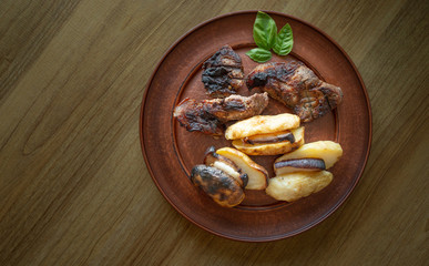 Baked Potatoes with Pork and Basil with copy space