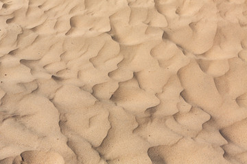Golden coloured sand pattern background