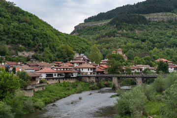 Fototapeta na wymiar Vladishki Bridge or Bishop`s Bridge, medieval bridge through the River Yantra. Veliko Tarnovo, Bulgaria