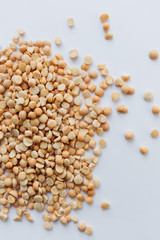  raw dry peas on white, macro