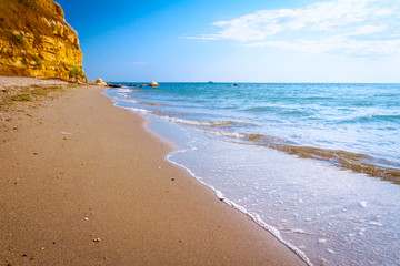 Cliff above idyllic and peaceful bay