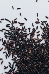 Pile of raw black rice, macro