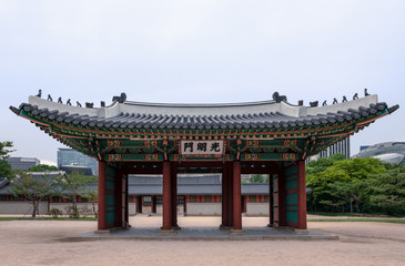 Naklejka premium Gwangmyeongmun Gate, once the south gate at Deoksugung Palace, a palace inhabited by members of Korea's royal family during the Joseon monarchy, located in Seoul.