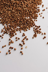 Raw buckwheat on white background