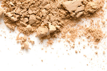 Beige crashed face powder for makeup as sample of cosmetic product, isolated on white background - Image