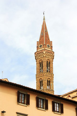 Obraz premium Stone tower with a spire in Florence, Italy