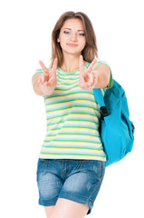 Beautiful girl student with school bag showing victory sign, isolated on white background