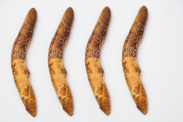 Balkan baguettes on white background.