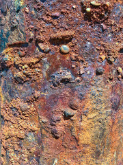 Corrosion of metal under the influence of wind, sun and salty sea water.