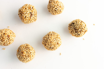 Healthy homemade cookies with nuts and sesame on white background
